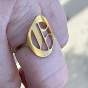 Old English Letter adjustable ring . Gold tone.
